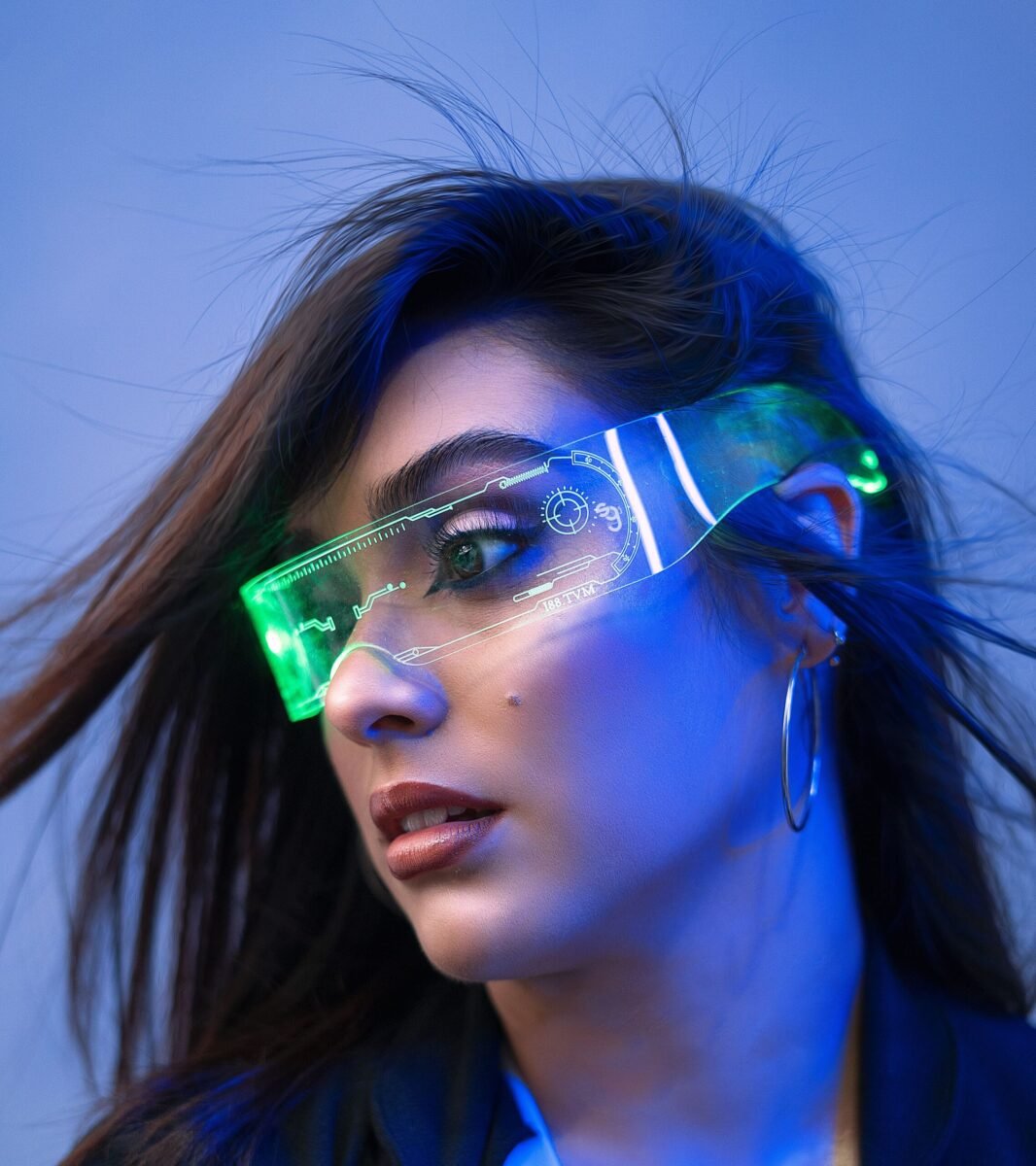 Close-up of a woman with futuristic goggles showcasing augmented reality technology.