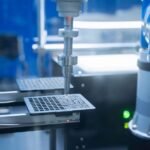 Close-up of robotic arm automating lab processes with precision.